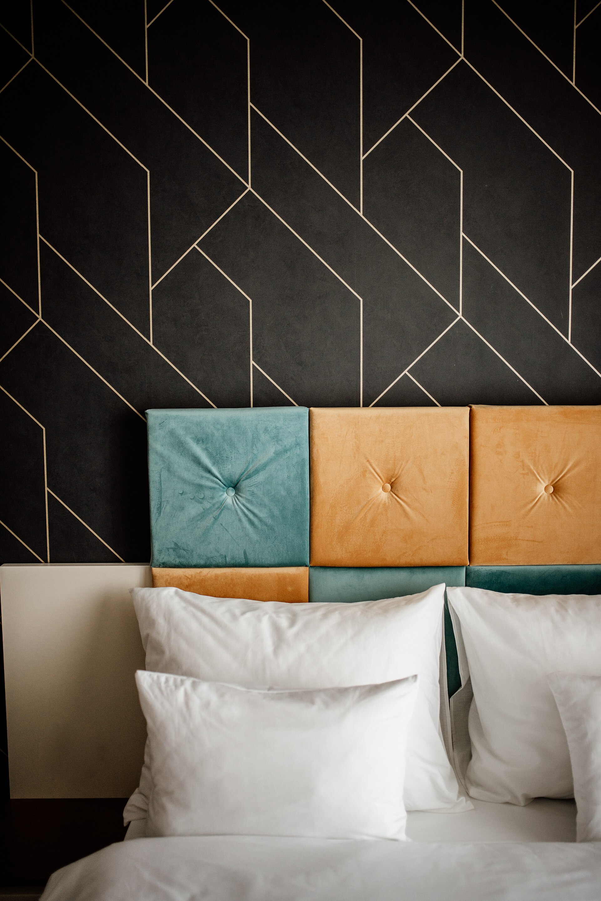 A stylish, well-lit bedroom that reads well in listing photos