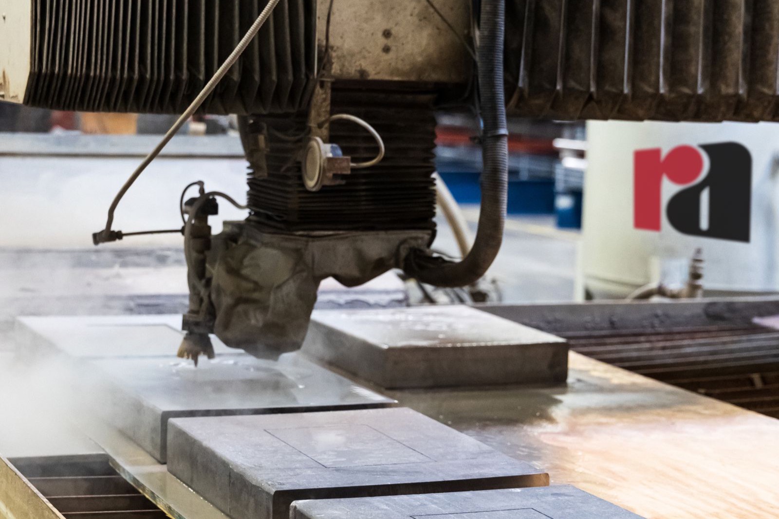 A CNC cutting machine working through metal from a vector file