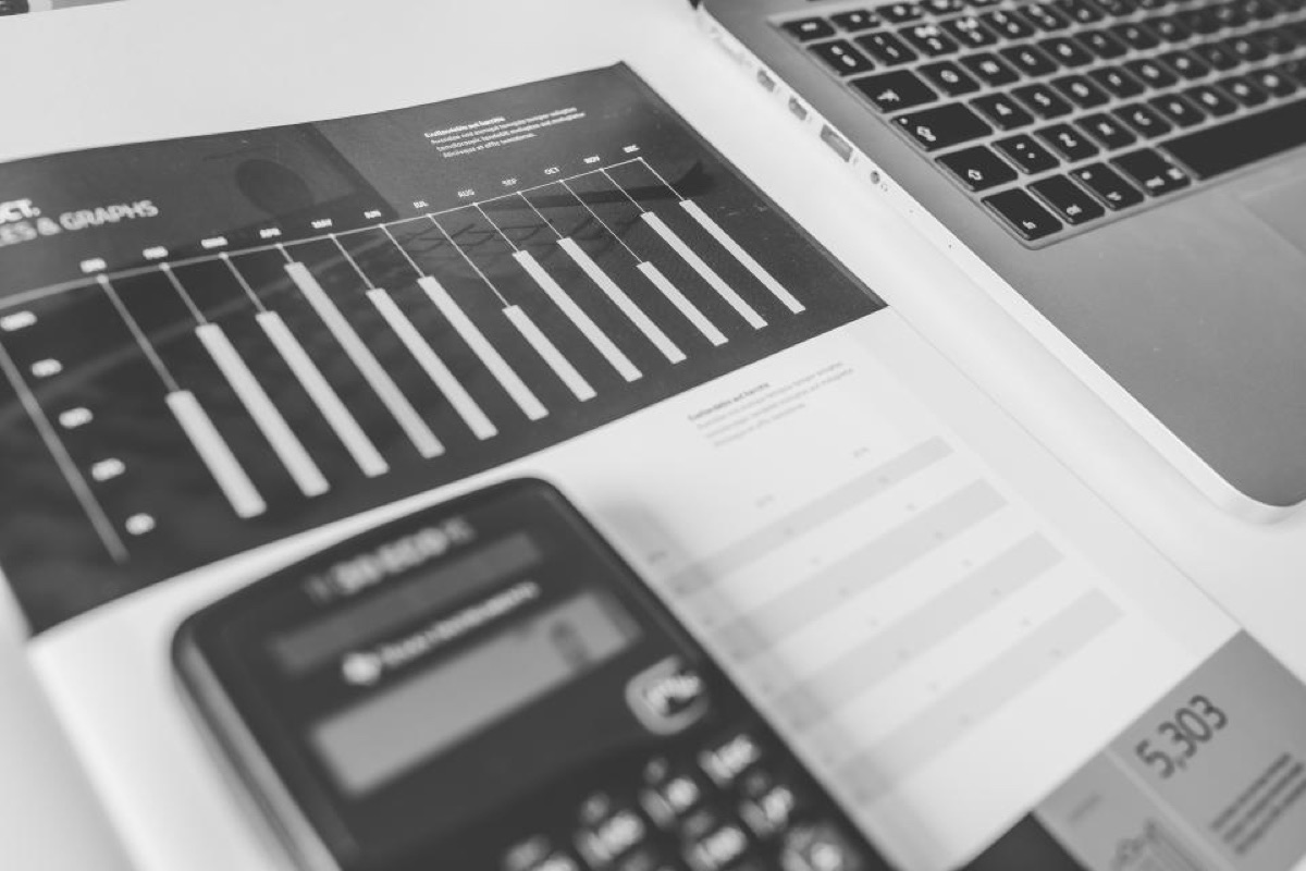 A calculator and notepad for working out the cost of missed calls